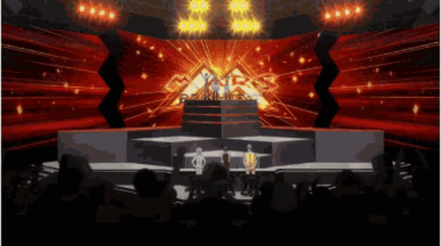 a group of people are standing on a stage in front of a crowd of people