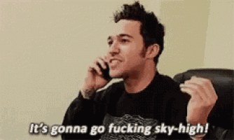 a man is talking on a cell phone and saying it 's gonna go fucking sky-high !