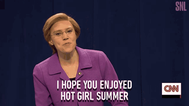 a woman in a purple suit is talking about hot girl summer