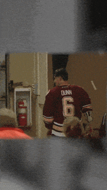 a man in a white jersey with the number 10 on the back