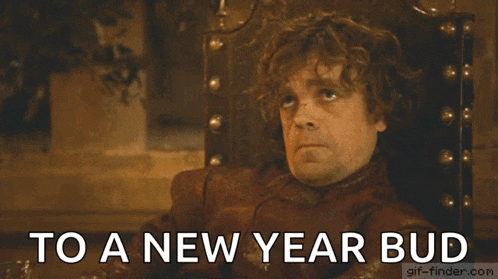 a man is sitting in a chair with the words to a new year bud written below him