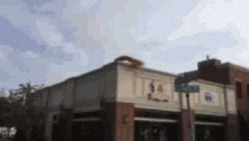 a blurry picture of a restaurant with a sign that says ' i love you '