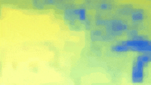 a yellow and blue background with a few spots
