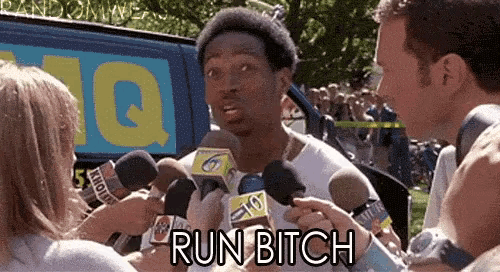 a man is being interviewed by a group of reporters with the words run bitch written on the bottom
