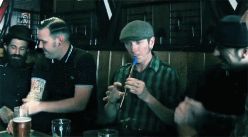 Playing Flute In The Pub GIF - Playing Flute In The Pub Having Fu GIFs