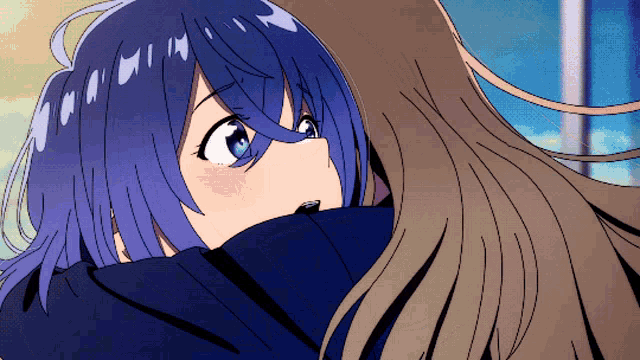 a girl with blue hair is hugging another girl with long hair