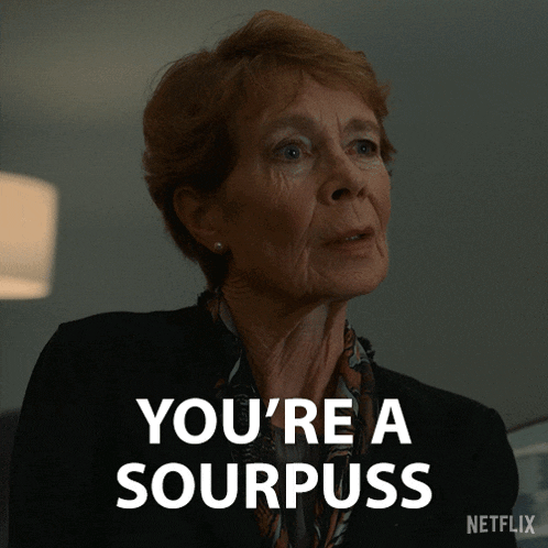 a woman says you 're a sourpuss on a netflix screen