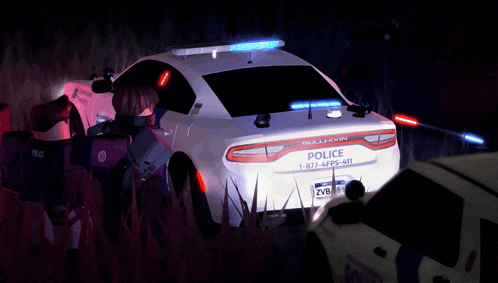 two police officers are standing in front of a dodge charger police car