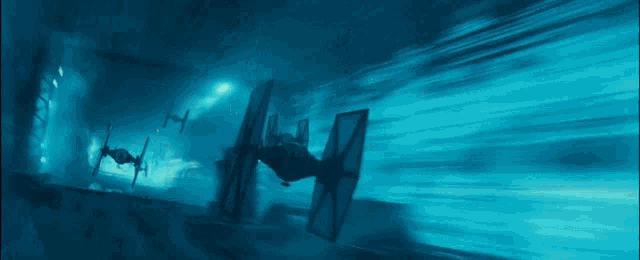a group of tie fighters flying through a tunnel