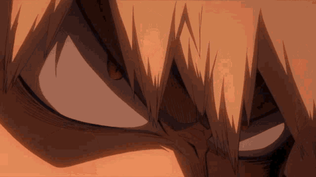 a close up of a person 's face with a very angry look on their face