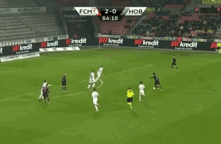 a soccer game between fcm and hob is being played