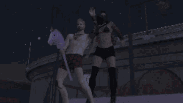 a man and a woman are dancing in front of a no dogs sign