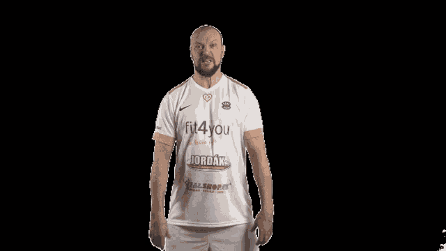 a man in a white shirt that says fit4you on it