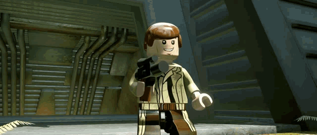 a lego figure holding a gun with a belt that says ' g ' on it