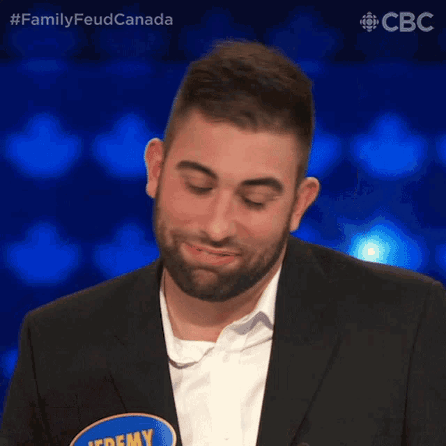 a man with the name jeremy on his shirt