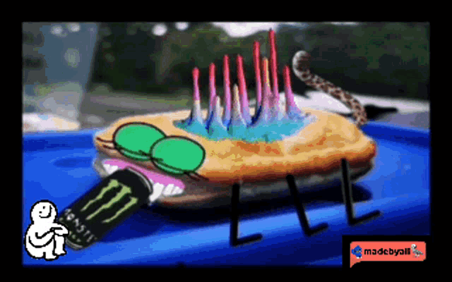 a monster energy drink is being poured into a sandwich