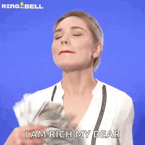 a woman is holding a bunch of money in her hands and says i am rich my dear
