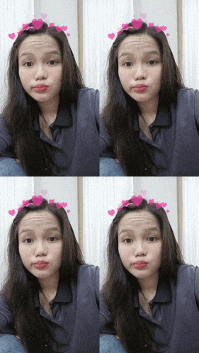 a girl with hearts on her hair makes a face