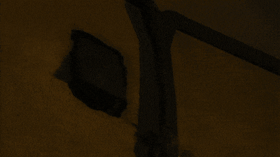 a blurred image of a woman with the words shut up above her head