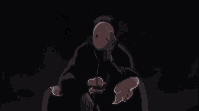 a person with a mask on their face and red clouds on their hands