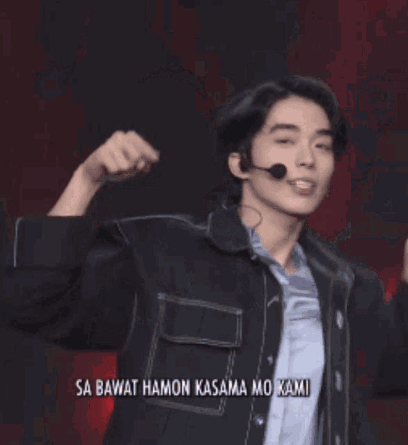 a man with his arms in the air and the words sa bawat hamon kasama mo kami on the bottom