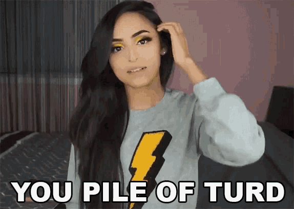 a woman is wearing a lightning bolt sweater and says you pile of turd