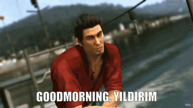 a man in a red shirt says " good morning yildirim "