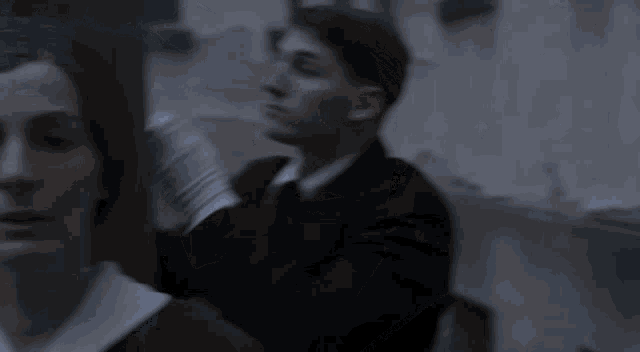 a blurry picture of a man and a woman