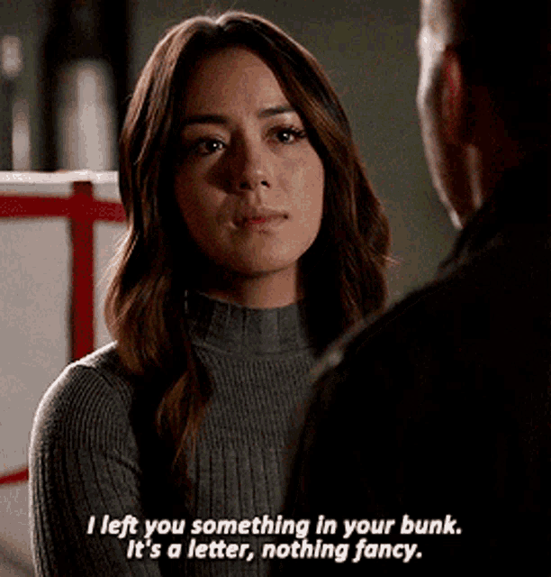 a woman is talking to a man and says i left you something in your bunk .