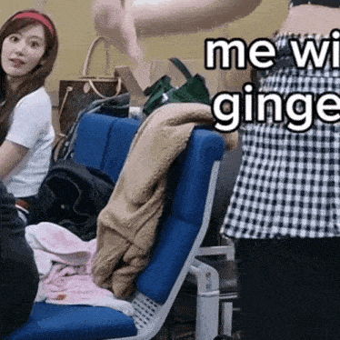 a woman in a plaid skirt is sitting in a chair with the words " me with ginger " on the bottom