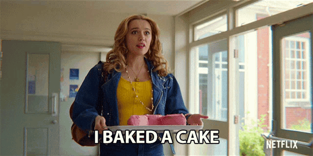 a woman is holding a pink cake and says i baked a cake