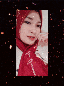 a woman wearing a red scarf that says i 'm a princess