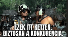 two men are standing next to each other and one of them is wearing a pirate hat