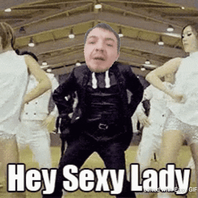 a man in a suit and tie is dancing in front of a group of women with the words hey sexy lady below him