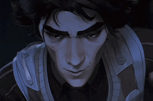 a close up of a man 's face with a serious look