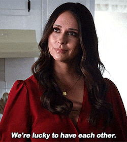 a woman in a red shirt is saying we 're lucky to have each other