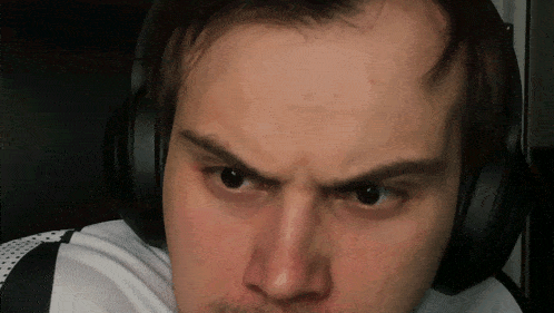 a close up of a man wearing headphones