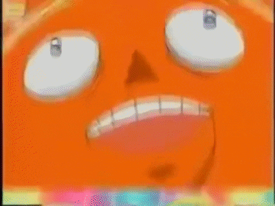 a cartoon sun with arms and legs is sitting on a table .