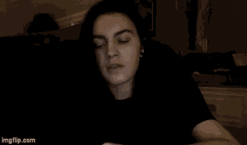 a person is sitting on a couch with their eyes closed and the website imgflip.com is in the corner