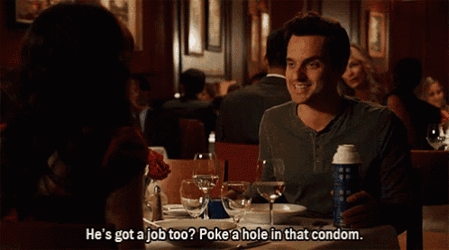 a man sitting at a table talking to a woman who is asking if he has a job too