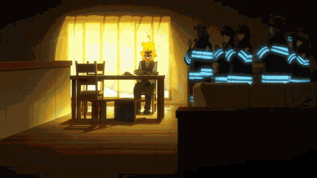 a group of firefighters standing in a room with a man sitting at a table