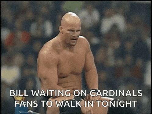 a man without a shirt is waiting on cardinals fans to walk in tonight .