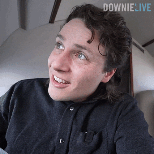 a man with downie live written on the bottom