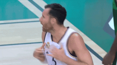 a basketball player with the number 5 on his jersey is screaming