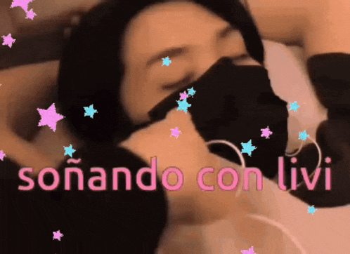 a woman wearing a mask with the words sonando con livi
