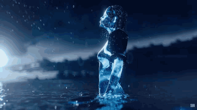 a woman standing in a body of water with the letters sub on the bottom right