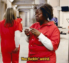 a woman in a red outfit says you fuckin ' weird