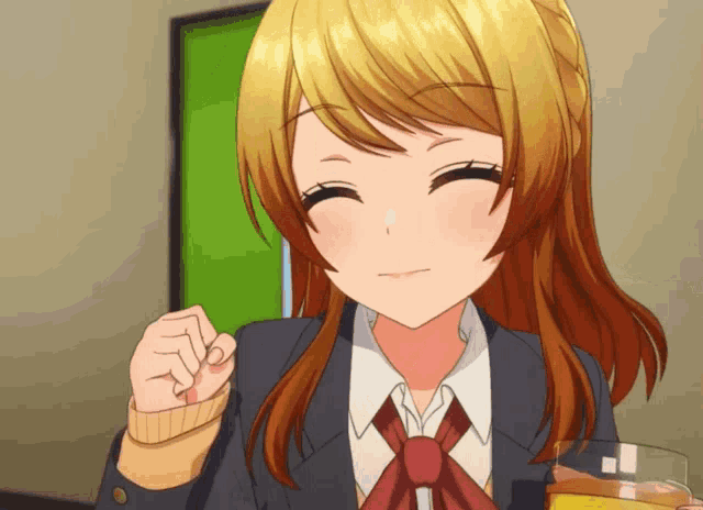 a girl in a school uniform is smiling and holding a glass