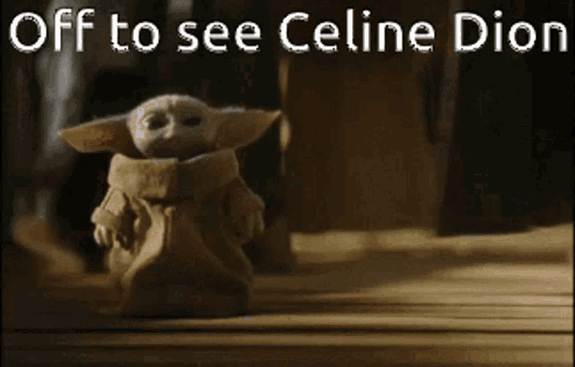 a baby yoda with the words off to see celine dion