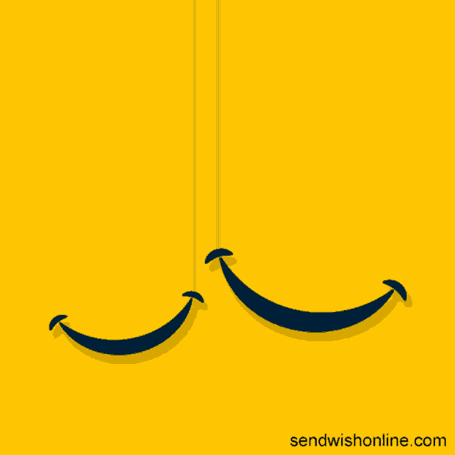 a yellow background with two smiley faces hanging from a string